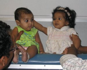 Babies on the train.  It is unclear whether they have doubled their birth weight.